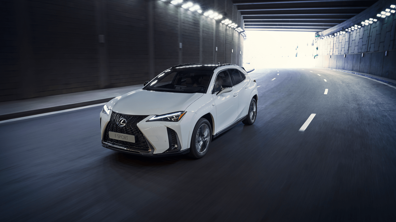 Lexus UX driving on a road