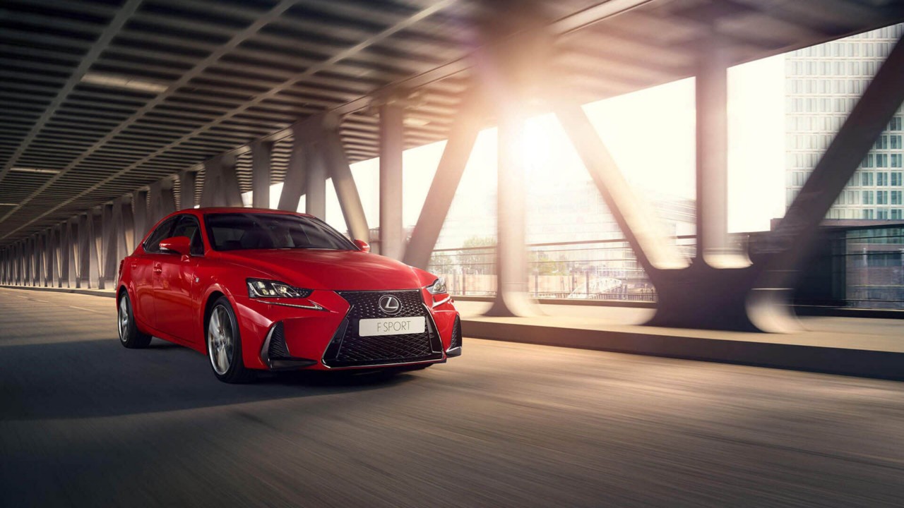 Lexus GS F Sport driving on a road 