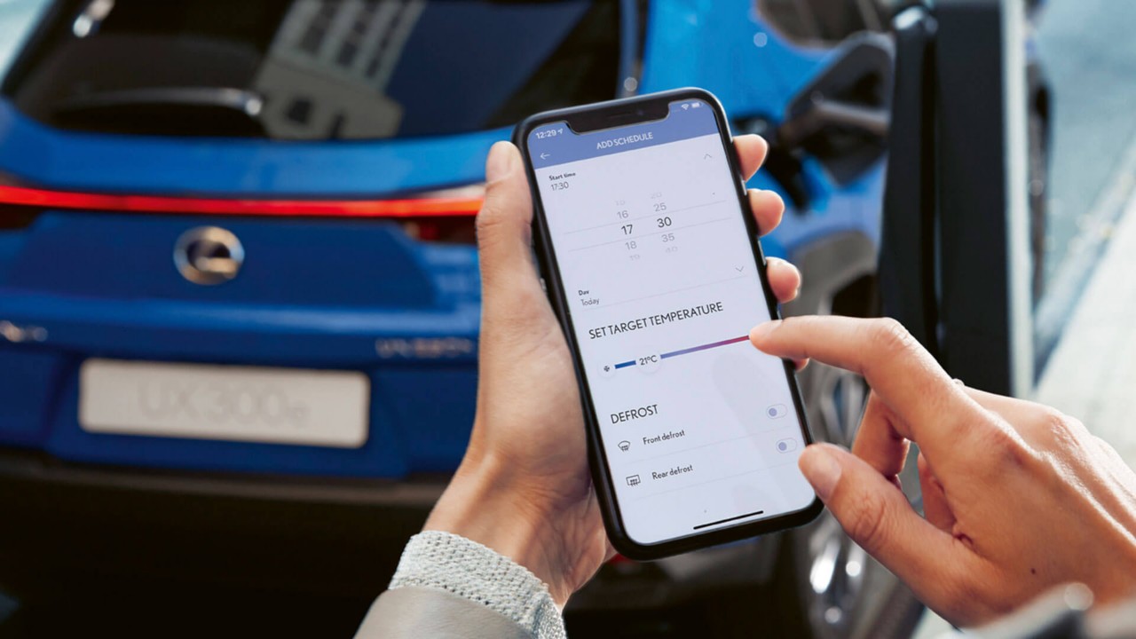 Mobile phone displaying the remote air conditioning and defroster feature on the Lexus Link app